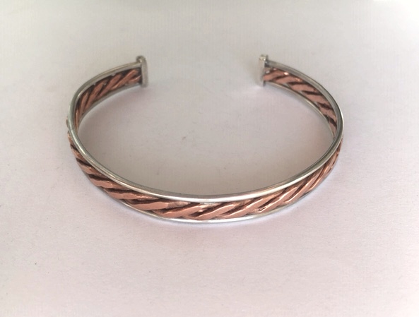 Silver and copper twist bangle
