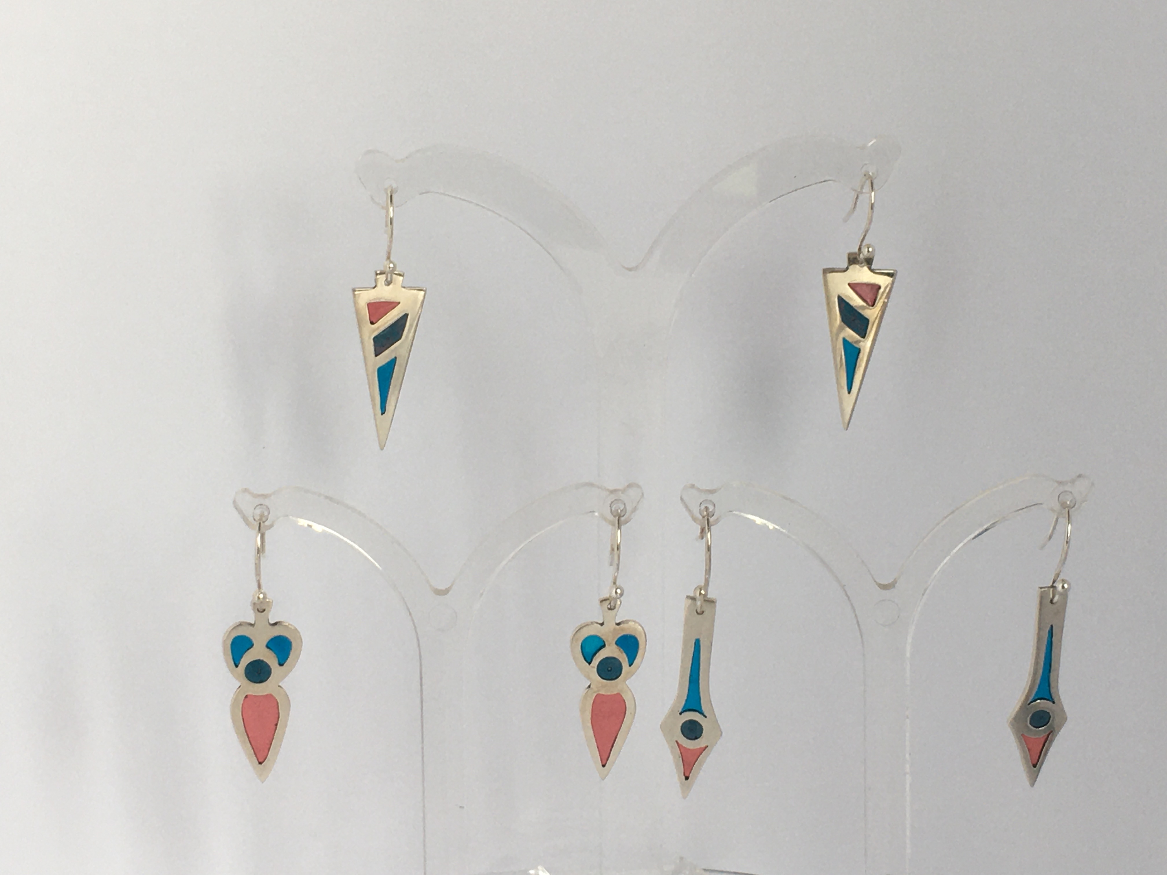 Silver earrings inset with coloured resin